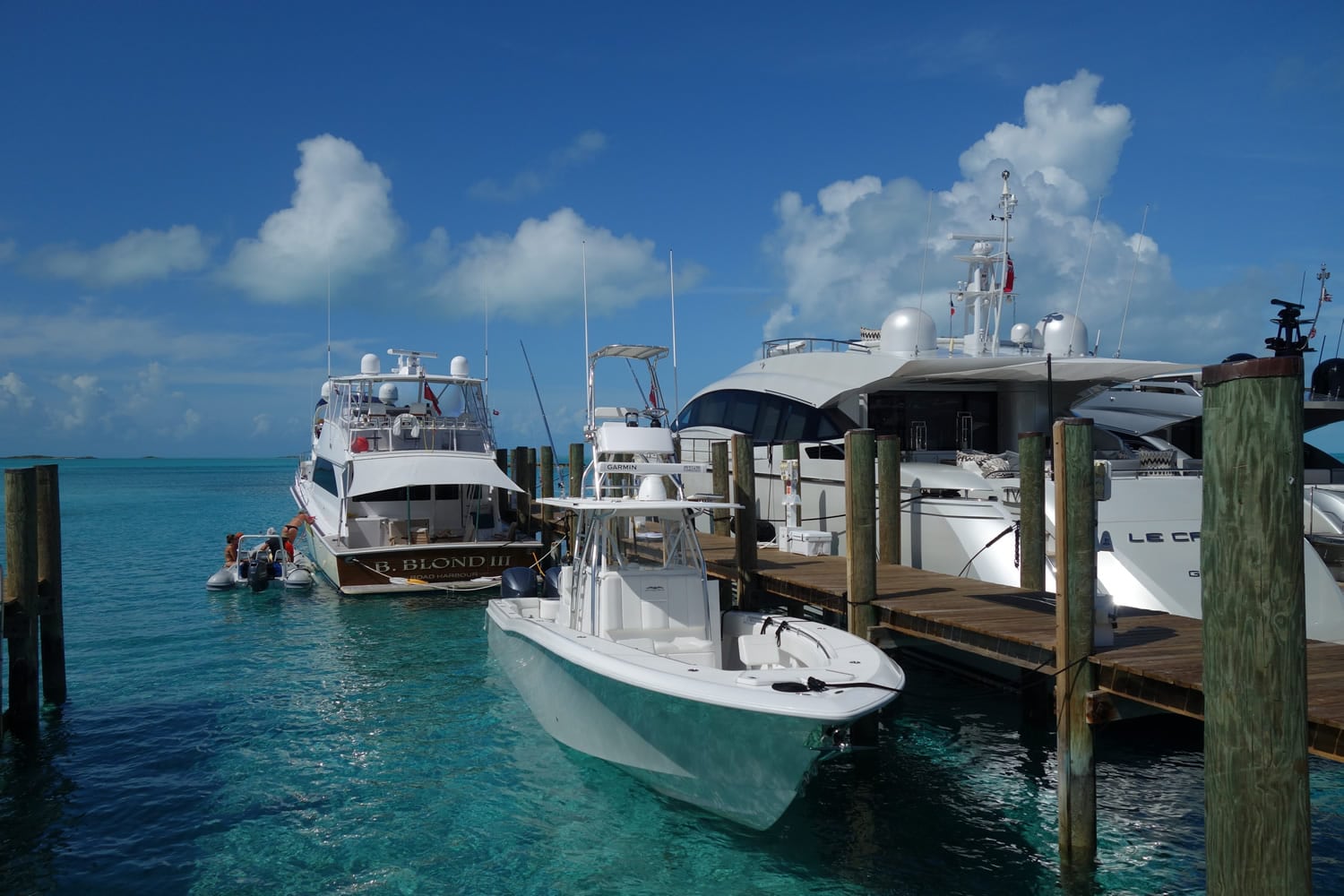 A white boat docked at Staniel Cay.
