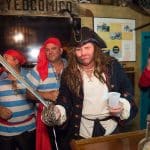 A group of people dressed as pirates at Staniel Cay Yacht Club in The Bahamas.