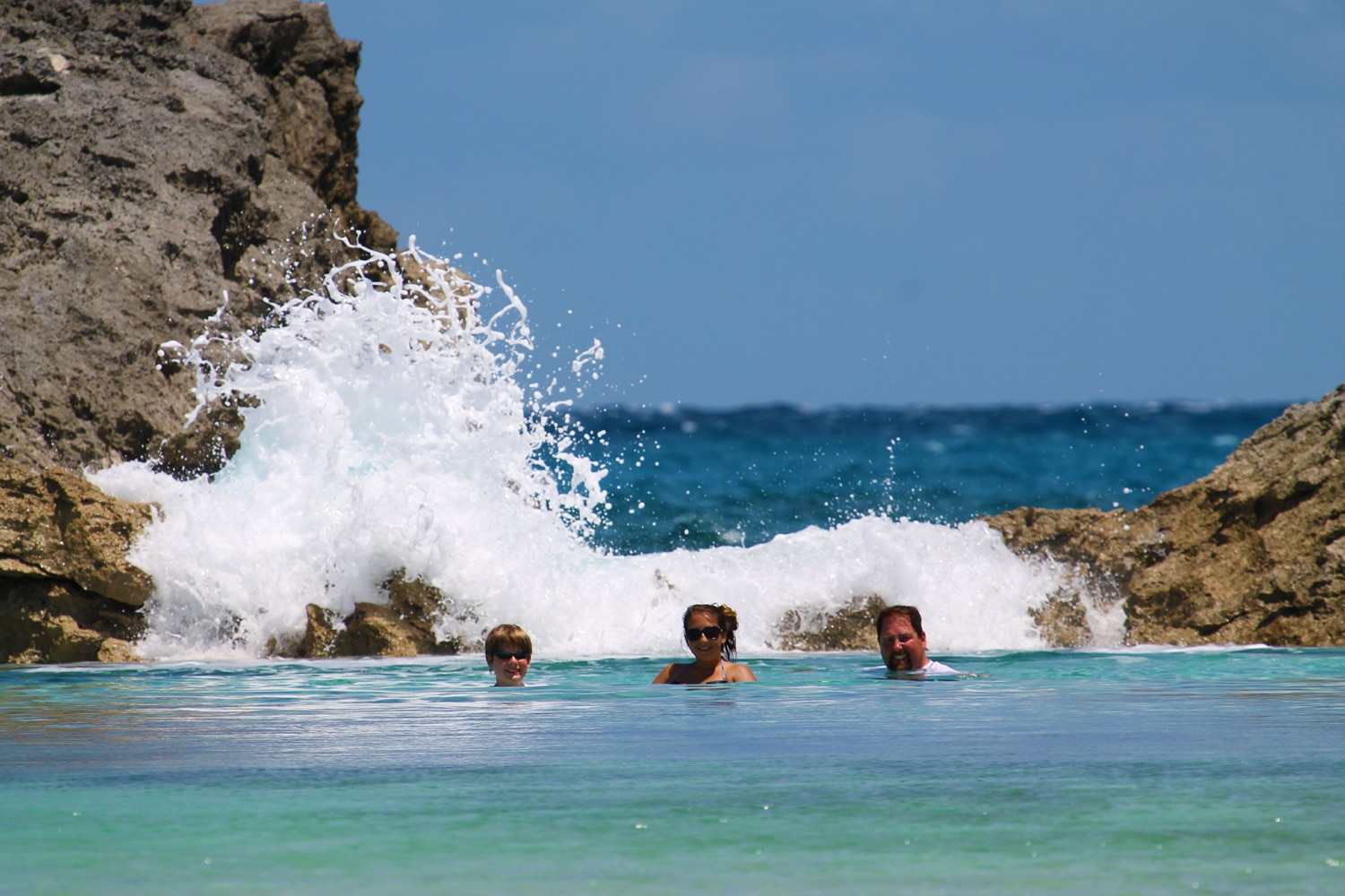 A group of people enjoying a vacation in the water at Staniel Cay, The Bahamas.