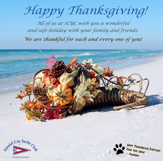 A happy thanksgiving card with a bouquet of flowers on the Staniel Cay beach in The Bahamas.