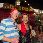 A man and woman donning pirate costumes partying at Staniel Cay Yacht Club.