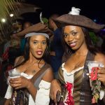 Two women dressed as pirates at Staniel Cay Yacht Club party in The Bahamas.